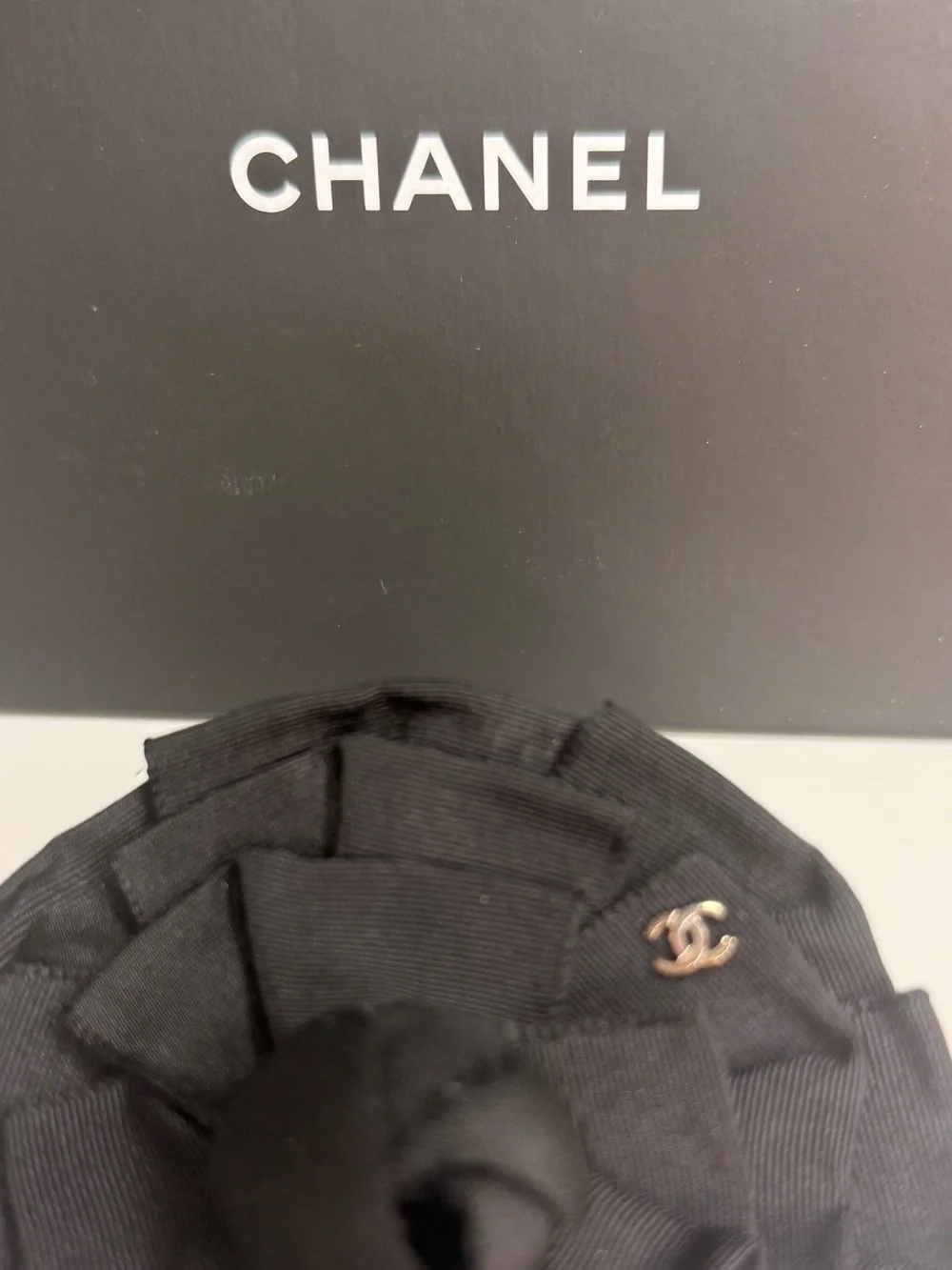 CHANEL Black Camellia Fabric Flower Pin with Gold CC Accent